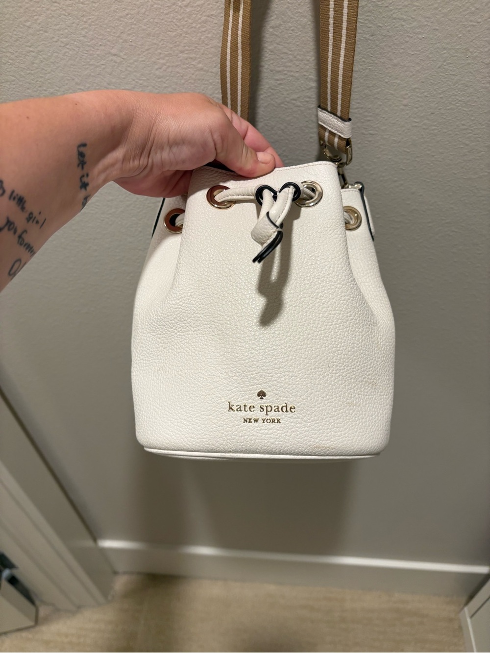kate spade White Pebbled Leather Bucket Crossbody with Tan Striped Strap